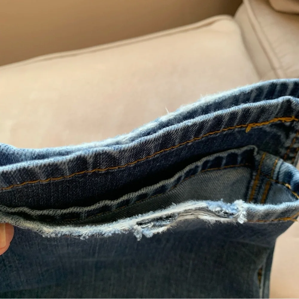 LEVIS.‎ Jeans, five pockets. Fraying on hem, and distressed W38/L34. Zipp…